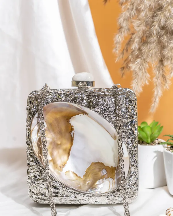 Kaia_Raw_Shell_Metal_Clutch